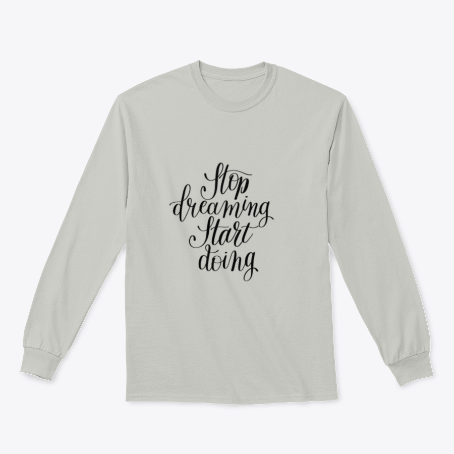 A cozy sweatshirt featuring the motivational quote 'Stop Dreaming Start Doing' in stylish typography, perfect for inspiring action.
