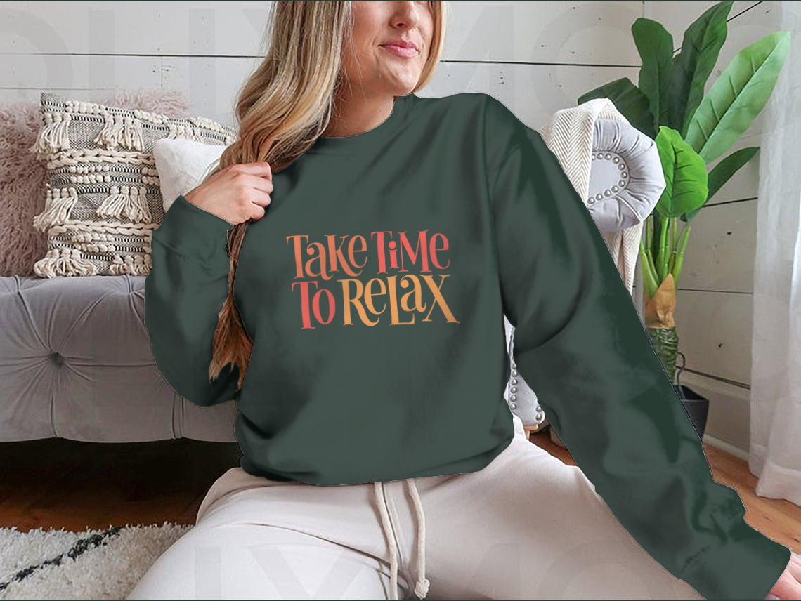 A cozy sweatshirt featuring the inspirational quote 'Take Time To Relax' designed for comfort and style.