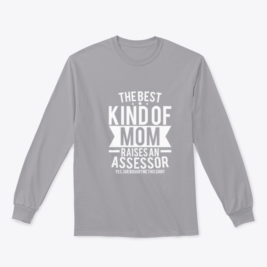 A humorous t-shirt that reads 'The Best Kind Of Mom Raises An Assessor Yes, She Bought Me This Shirt', showcasing a classic fit and soft fabric.