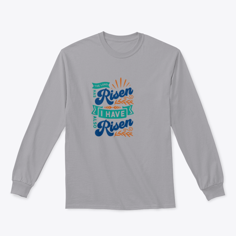 A motivational apparel featuring the phrase 'The Lord Has Risen I Have Also Risen' in a stylish design, made from a comfortable cotton/polyester blend.