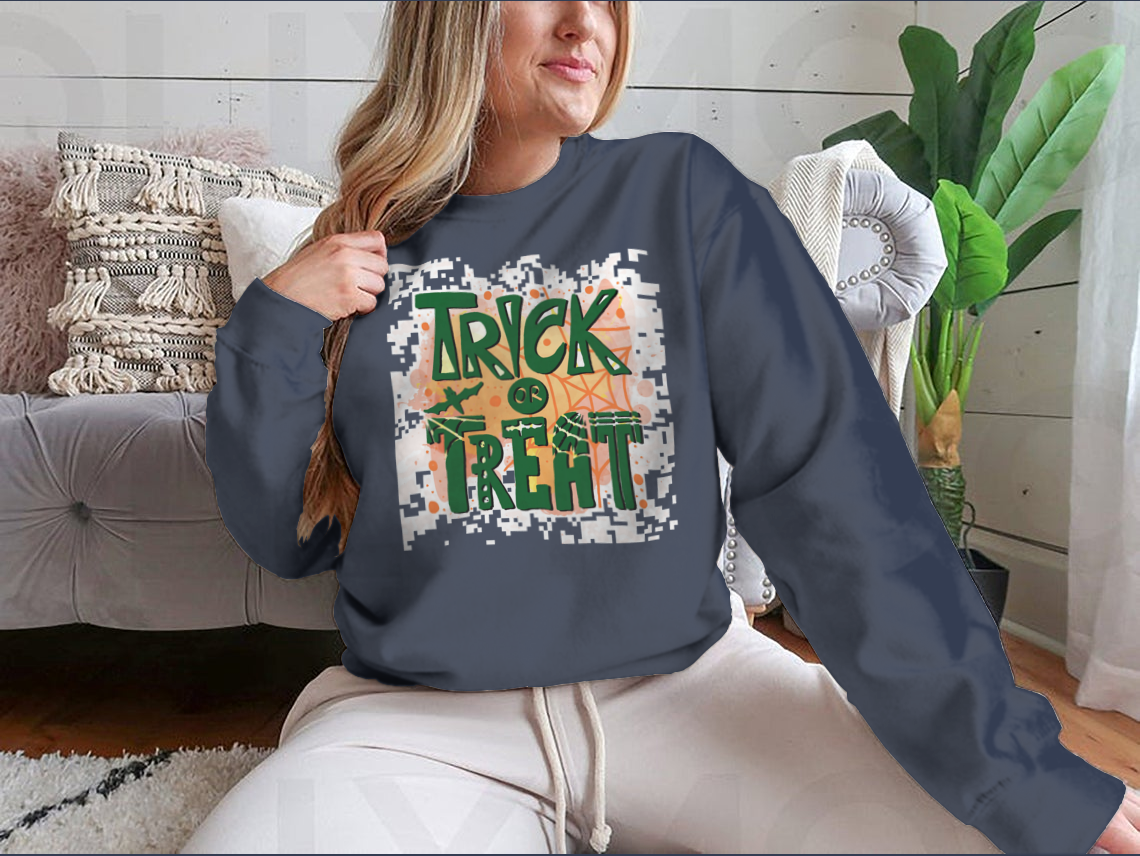 A cozy Trick Or Treat sweatshirt designed for Halloween, featuring a classic fit and festive graphics.
