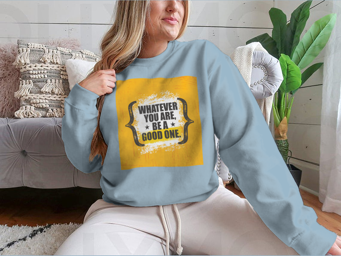 A stylish sweatshirt featuring the motivational phrase 'Whatever You Are, Be A Good One' in a classic fit, made from a soft cotton-polyester blend.