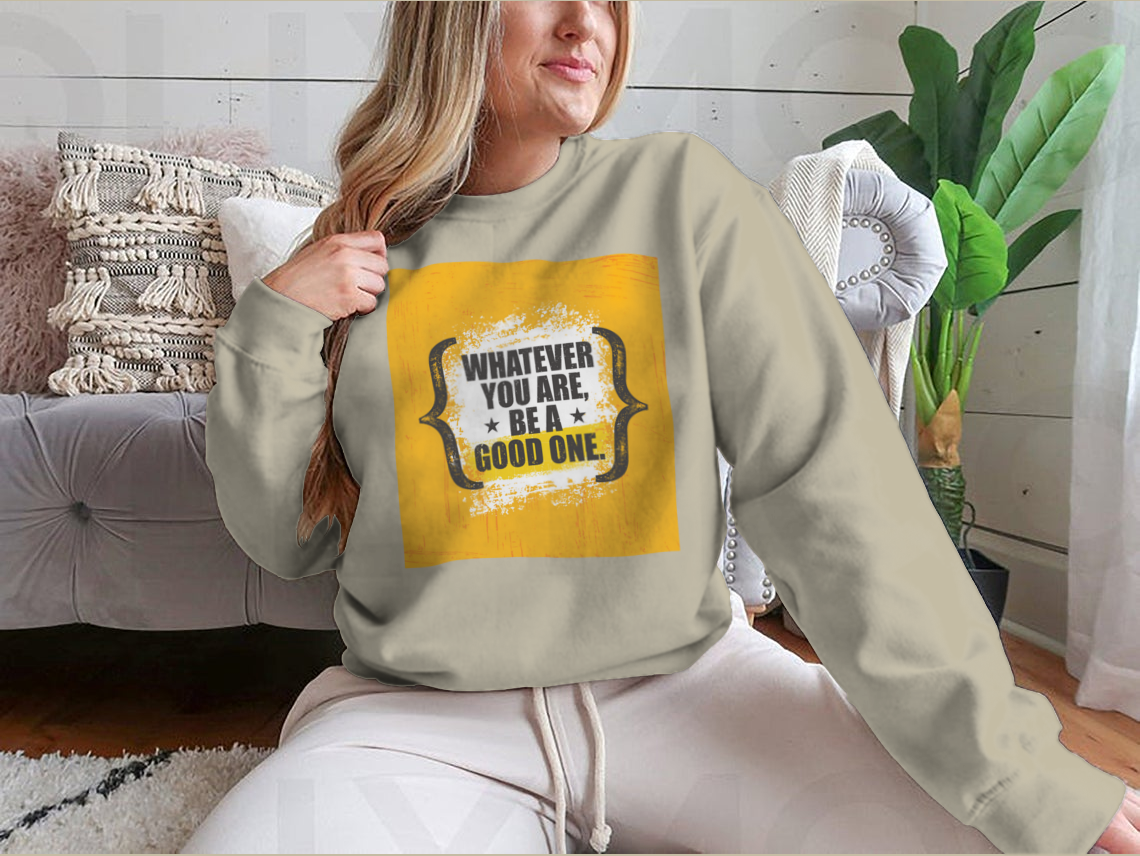 A stylish sweatshirt featuring the motivational phrase 'Whatever You Are, Be A Good One' in a classic fit, made from a soft cotton-polyester blend.