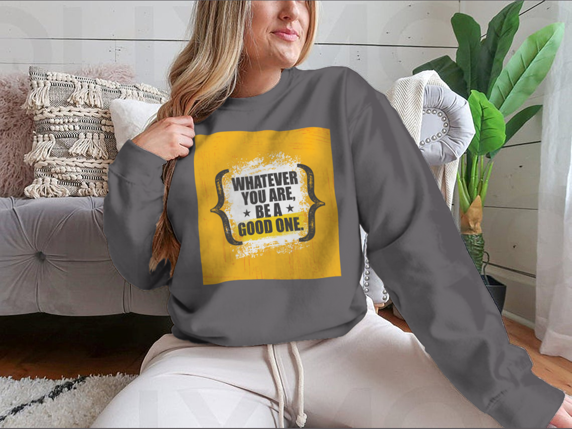 A stylish sweatshirt featuring the motivational phrase 'Whatever You Are, Be A Good One' in a classic fit, made from a soft cotton-polyester blend.