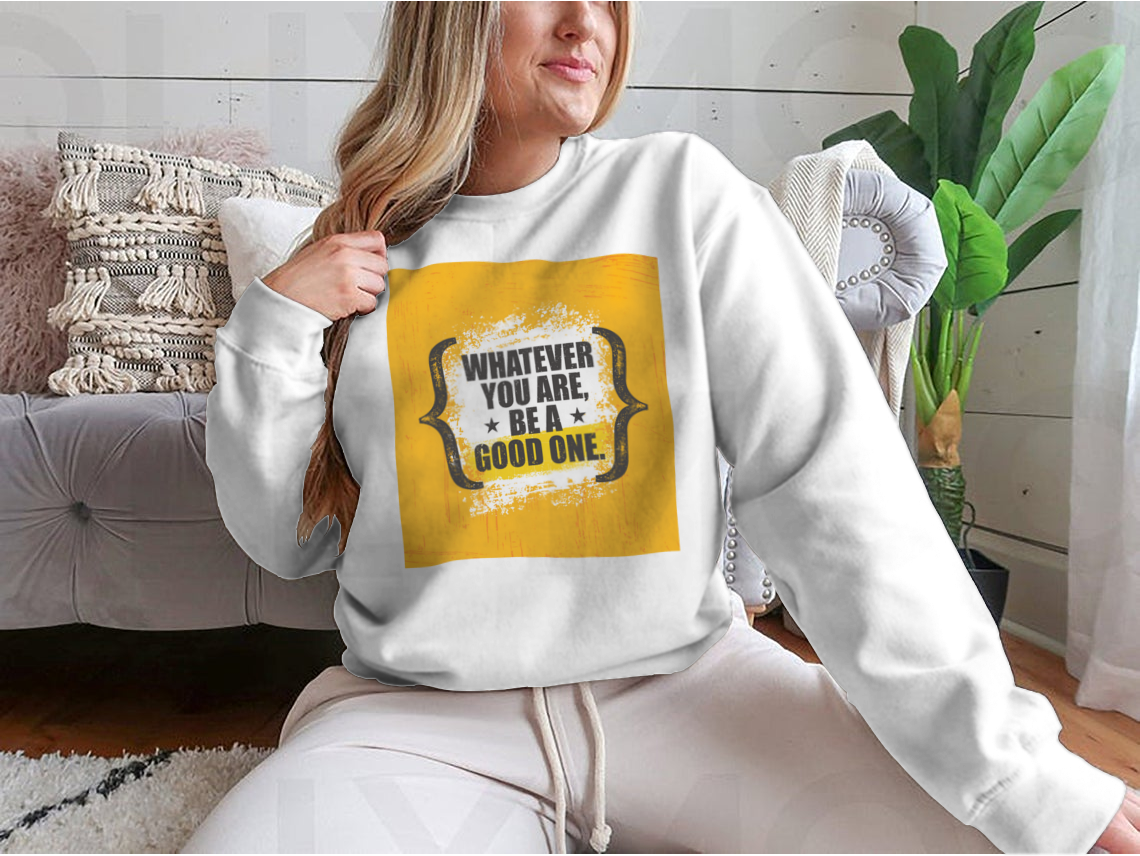 A stylish sweatshirt featuring the motivational phrase 'Whatever You Are, Be A Good One' in a classic fit, made from a soft cotton-polyester blend.