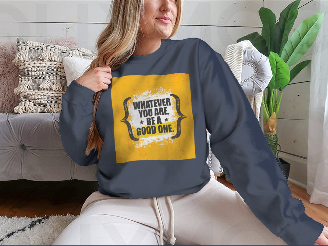 A stylish sweatshirt featuring the motivational phrase 'Whatever You Are, Be A Good One' in a classic fit, made from a soft cotton-polyester blend.