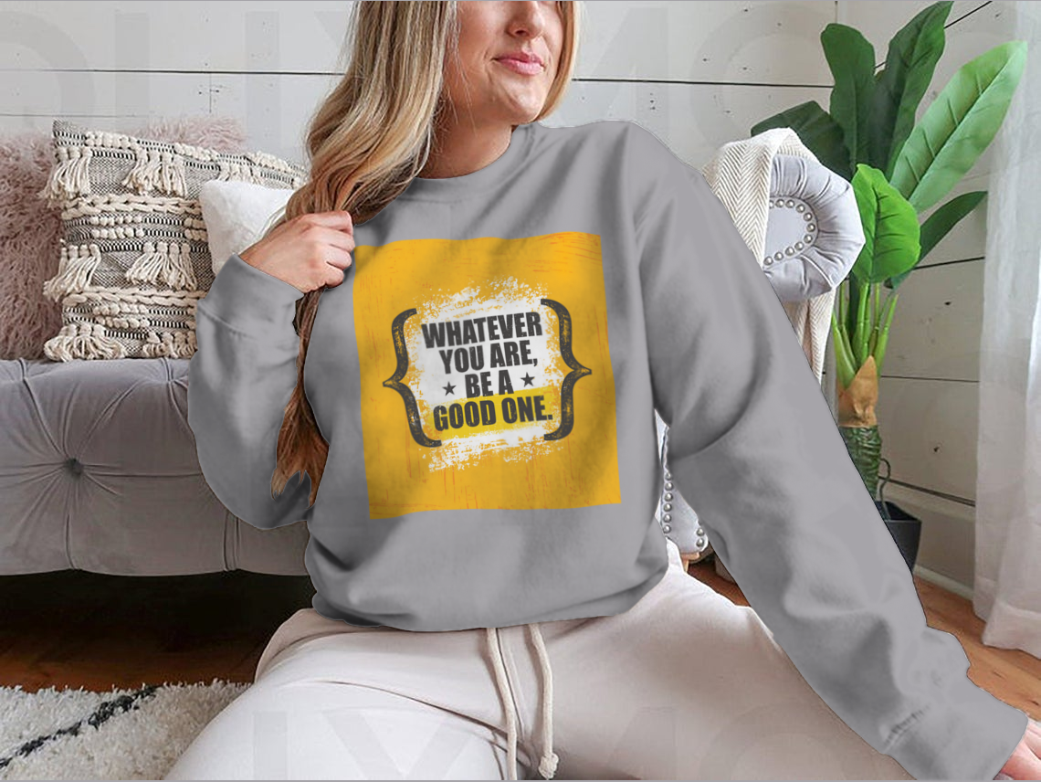A stylish sweatshirt featuring the motivational phrase 'Whatever You Are, Be A Good One' in a classic fit, made from a soft cotton-polyester blend.