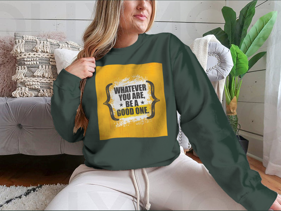 A stylish sweatshirt featuring the motivational phrase 'Whatever You Are, Be A Good One' in a classic fit, made from a soft cotton-polyester blend.