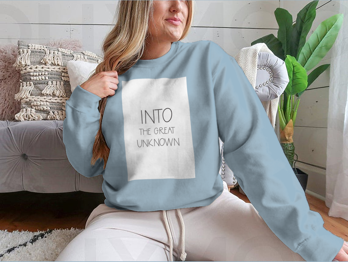 A cozy sweatshirt featuring a wild quote design, perfect for casual wear and adventures.