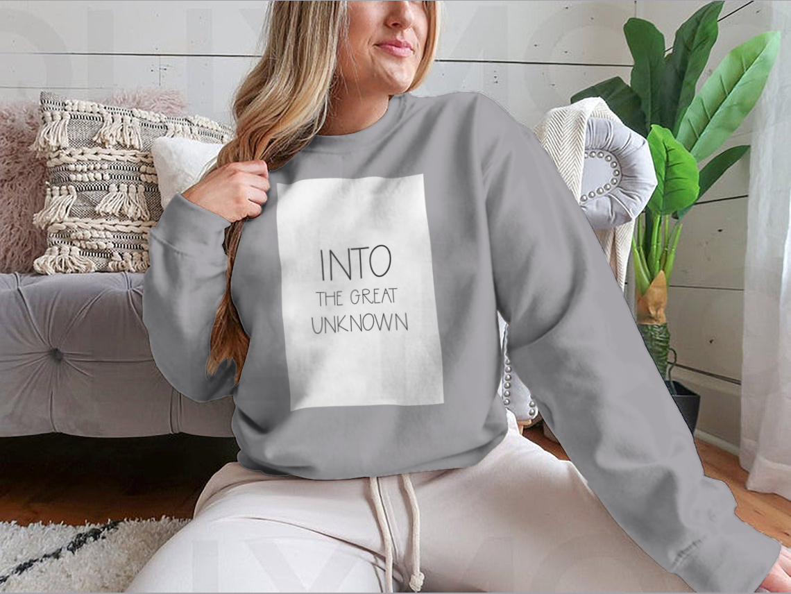 A cozy sweatshirt featuring a wild quote design, perfect for casual wear and adventures.