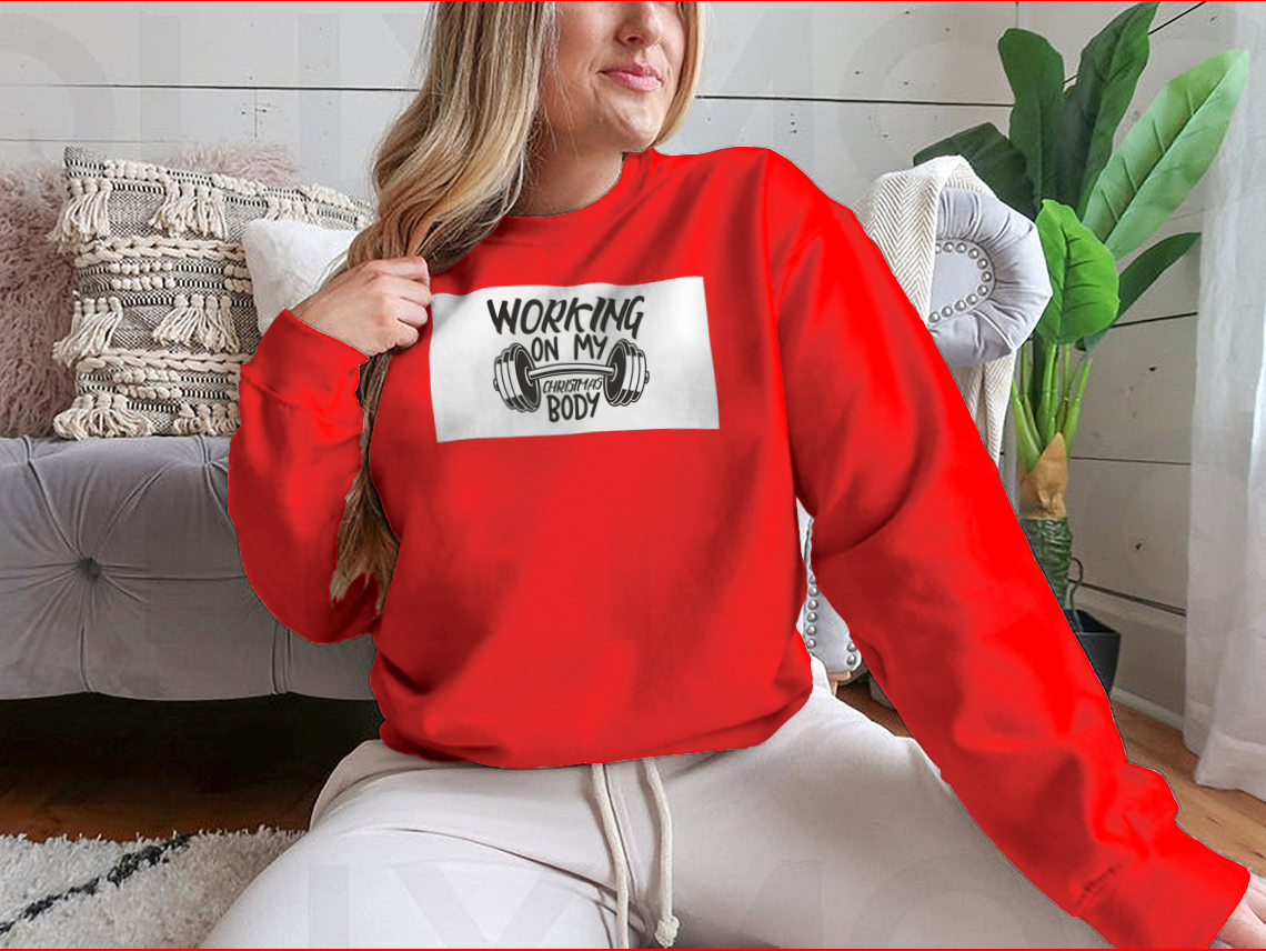 A cozy sweatshirt featuring the phrase 'Working On My Christmas Body', perfect for holiday celebrations.