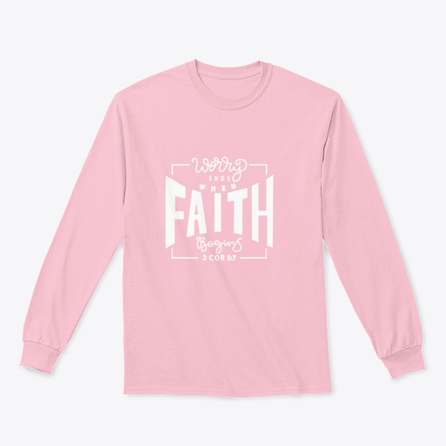 A cozy sweatshirt featuring the inspirational phrase 'Worry Ends When Faith Begins', showcasing a classic fit and soft fabric.