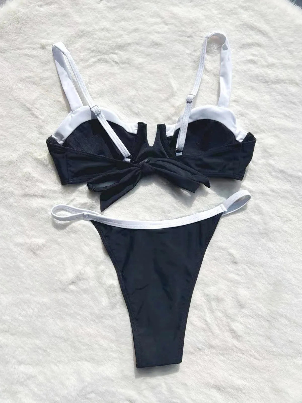 Stylish Beatz two piece swimsuit in black, featuring a trendy patchwork design and wire-free support, perfect for summer beach outings.