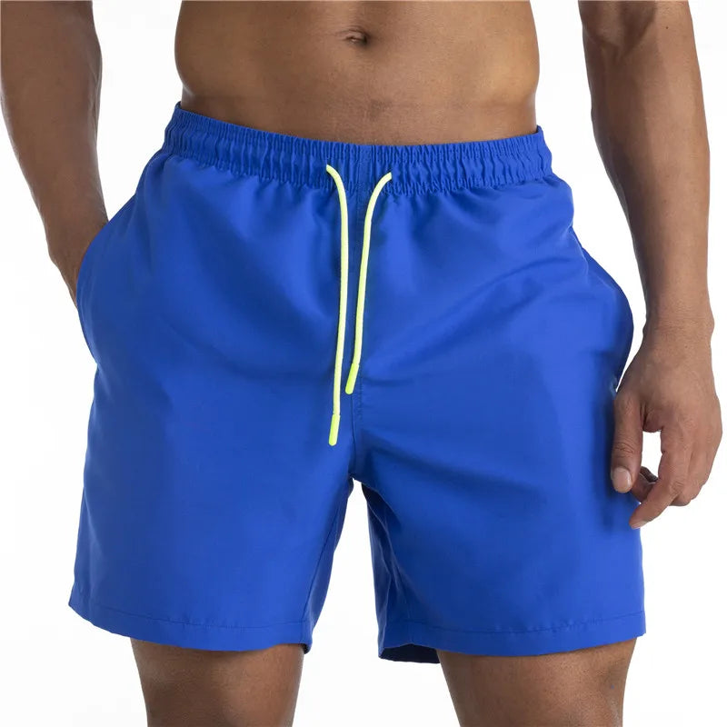 Sunga Beach Shorts in solid pattern, made of durable polyester, designed for men's swimming and beach activities.