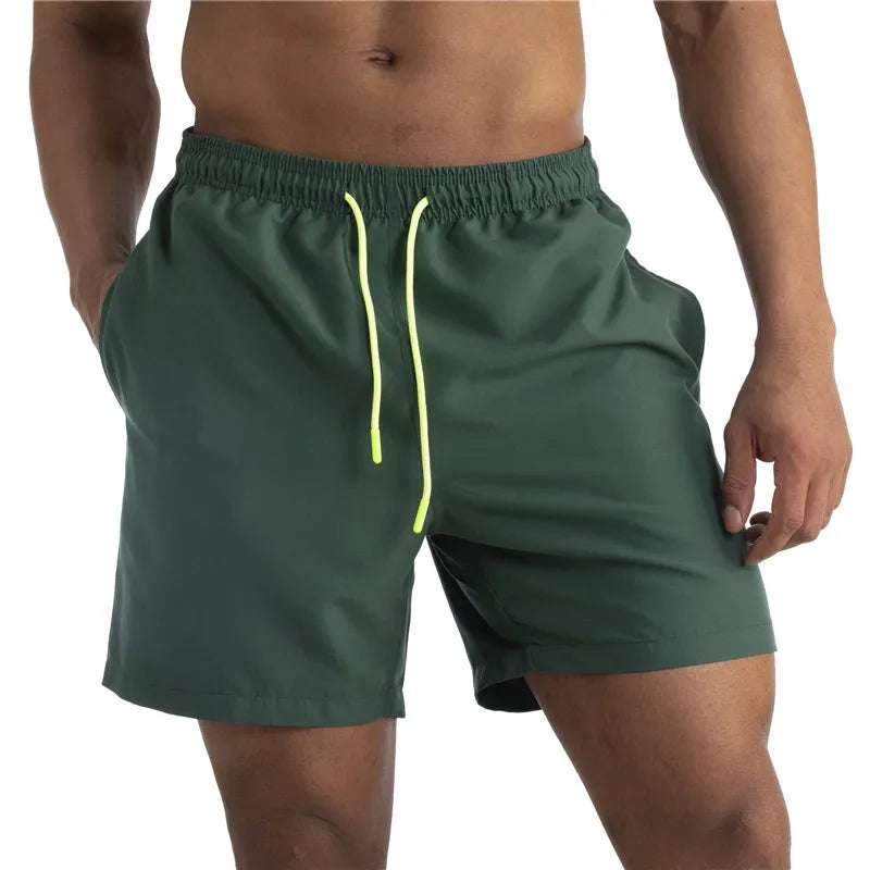 Sunga Beach Shorts in solid pattern, made of durable polyester, designed for men's swimming and beach activities.