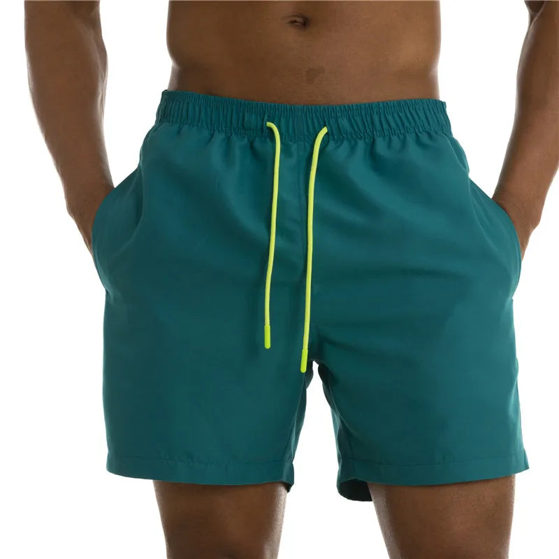 Sunga Beach Shorts in solid pattern, made of durable polyester, designed for men's swimming and beach activities.