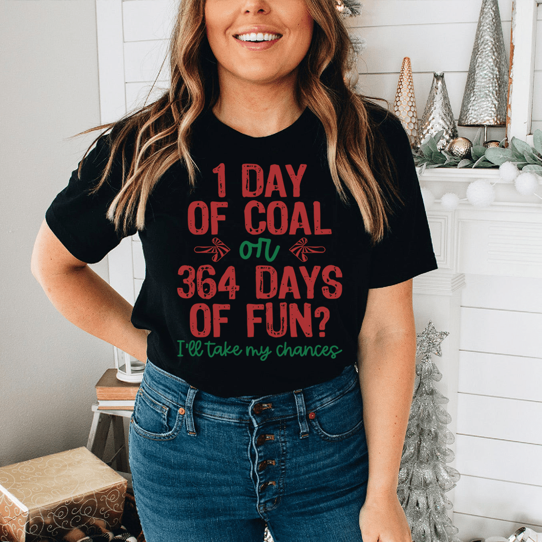 A festive Christmas-themed tee featuring the phrase '1 Day Of Coal Or 364 Days Of Fun', made from 100% soft cotton with vibrant colors.