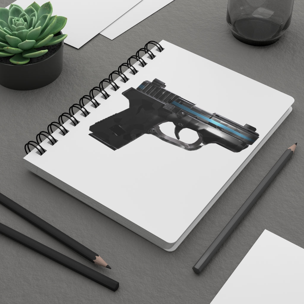 22 Calibur Spiral Bound Journal with glossy laminated cover and lined pages, showcasing its stylish design and compact size.