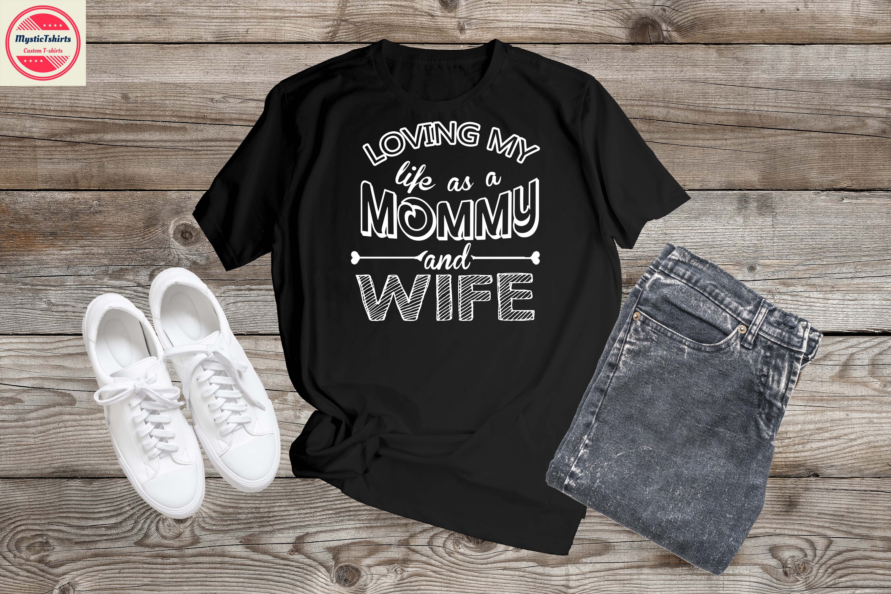 Custom-made shirt featuring the phrase 'Loving My Life as a Mommy and Wife', showcasing a stylish design suitable for mothers.
