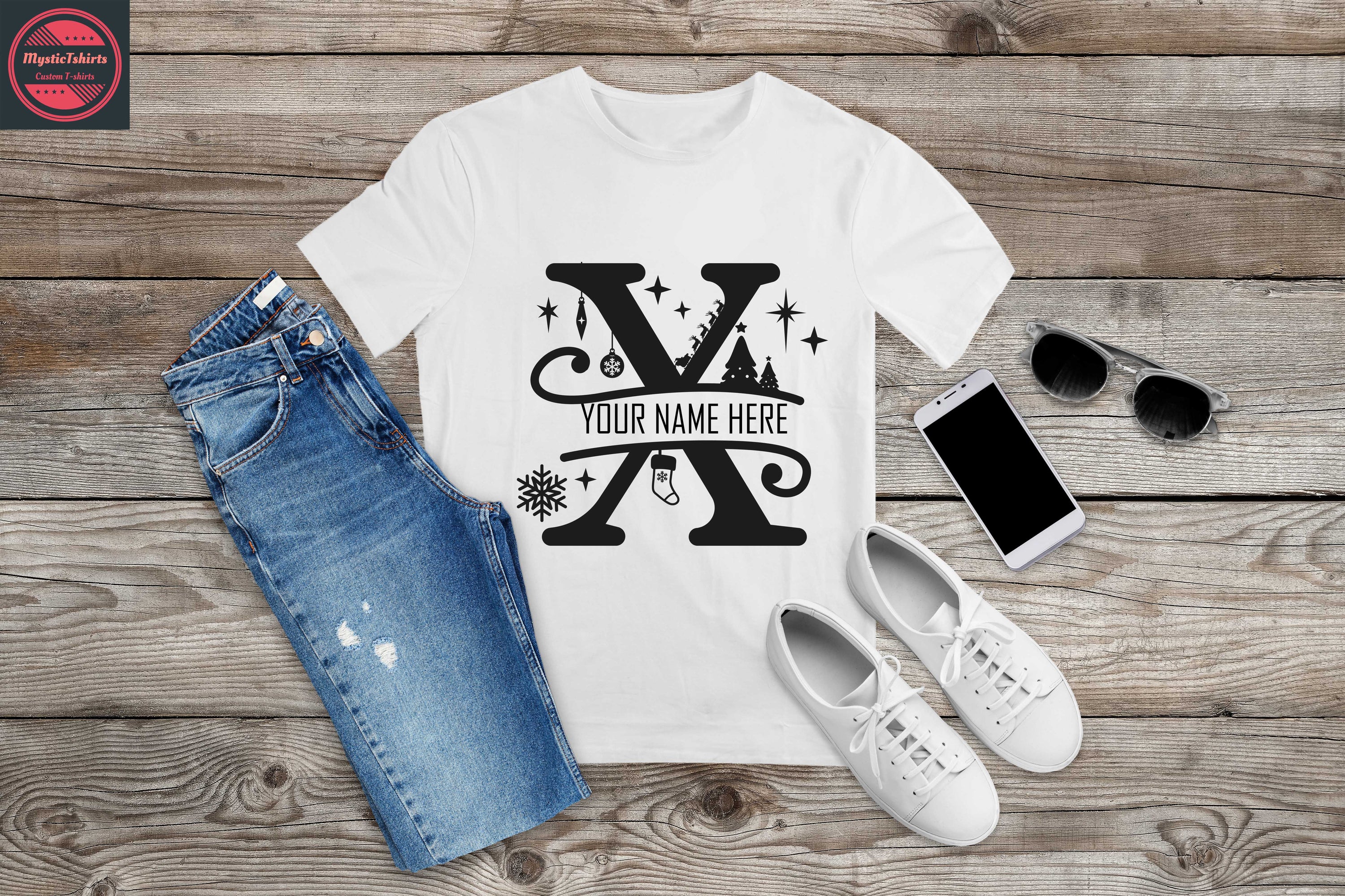 Custom Monogrammed Christmas X shirt displayed on a hanger, showcasing vibrant colors and high-quality fabric.