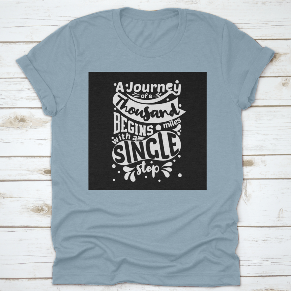 Premium cotton t-shirt featuring the phrase 'A Journey Of A Thousand Miles Begins With A Single Step' in a classic fit.