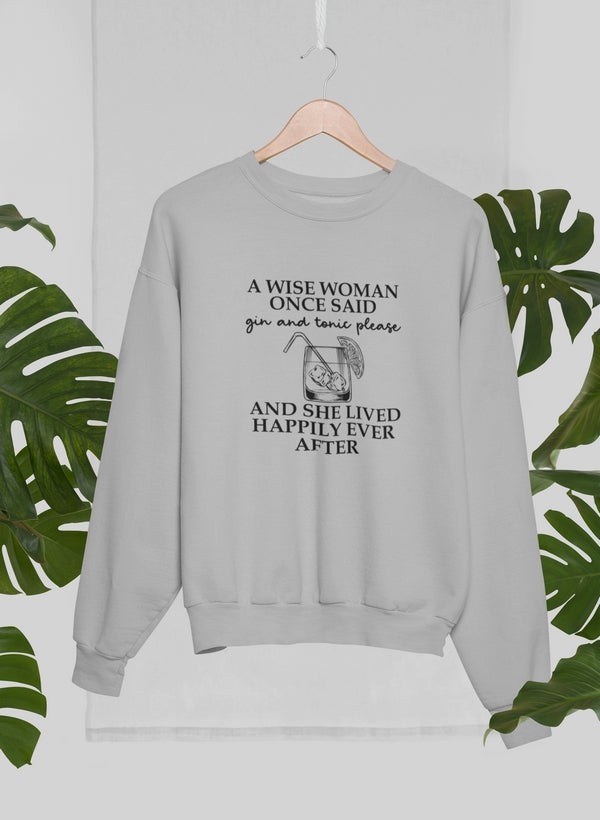 A cozy sweatshirt featuring the phrase 'A Wise Woman Once Said Gin & Tonic Please', designed for comfort and style.