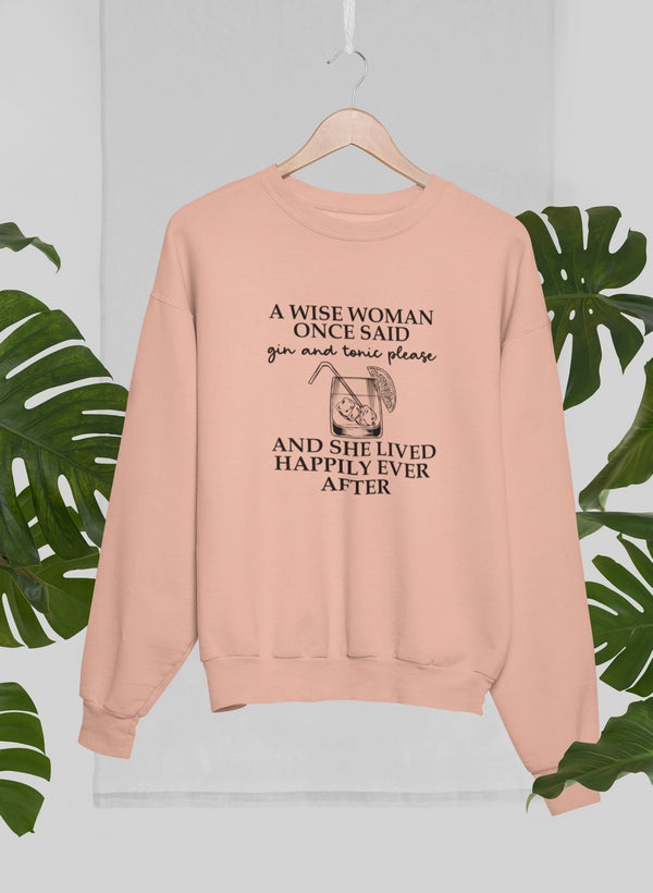 A cozy sweatshirt featuring the phrase 'A Wise Woman Once Said Gin & Tonic Please', designed for comfort and style.
