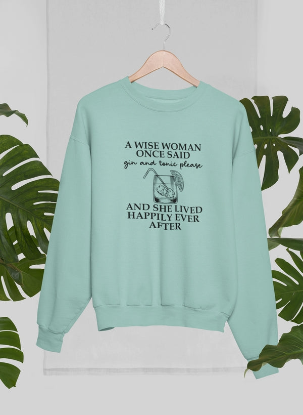 A cozy sweatshirt featuring the phrase 'A Wise Woman Once Said Gin & Tonic Please', designed for comfort and style.