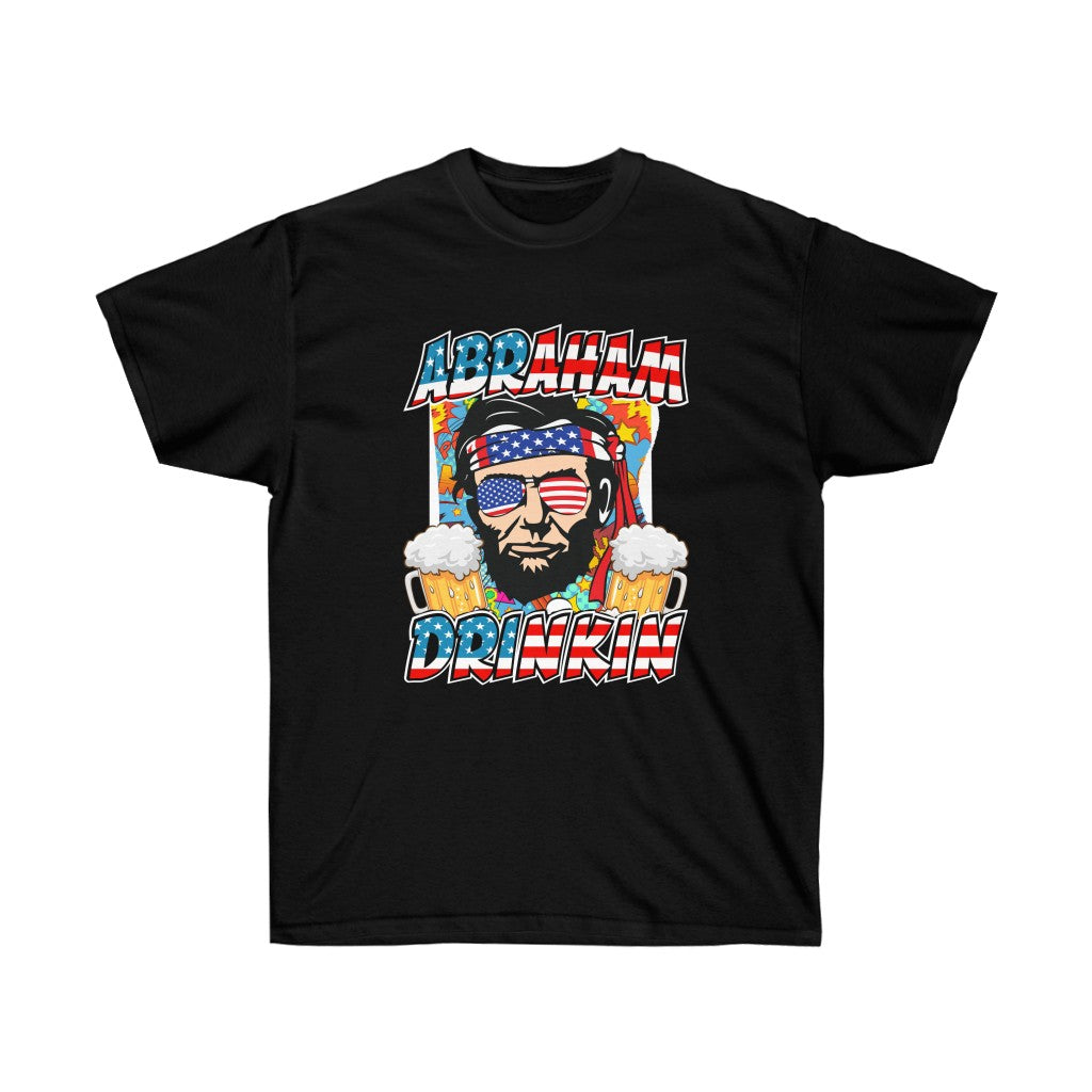 Abraham Drinking July 4th T-Shirt featuring a patriotic design, made from 100% soft cotton, perfect for Independence Day celebrations.
