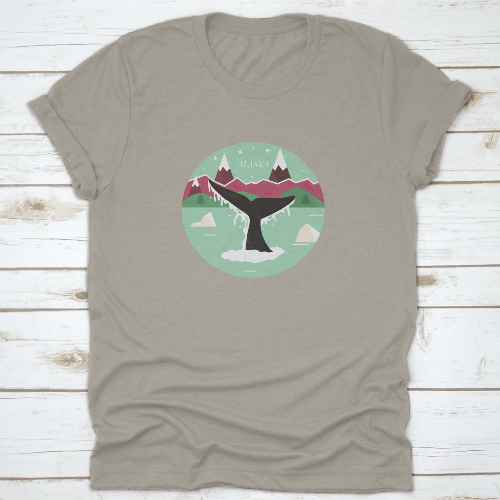 Alaska Glacial Landscape T-shirt featuring a whale logo icon, showcasing a scenic design with mountains and forests.