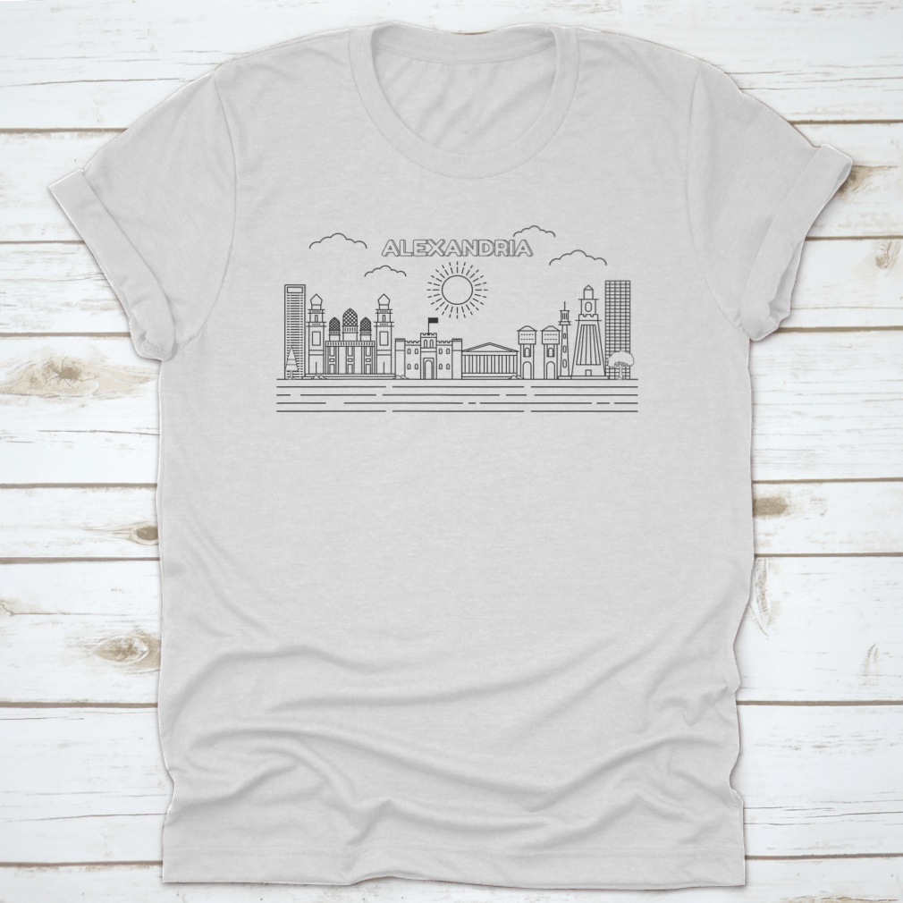 A stylish t-shirt featuring a line art illustration of the Alexandria skyline, showcasing its iconic buildings and structures.