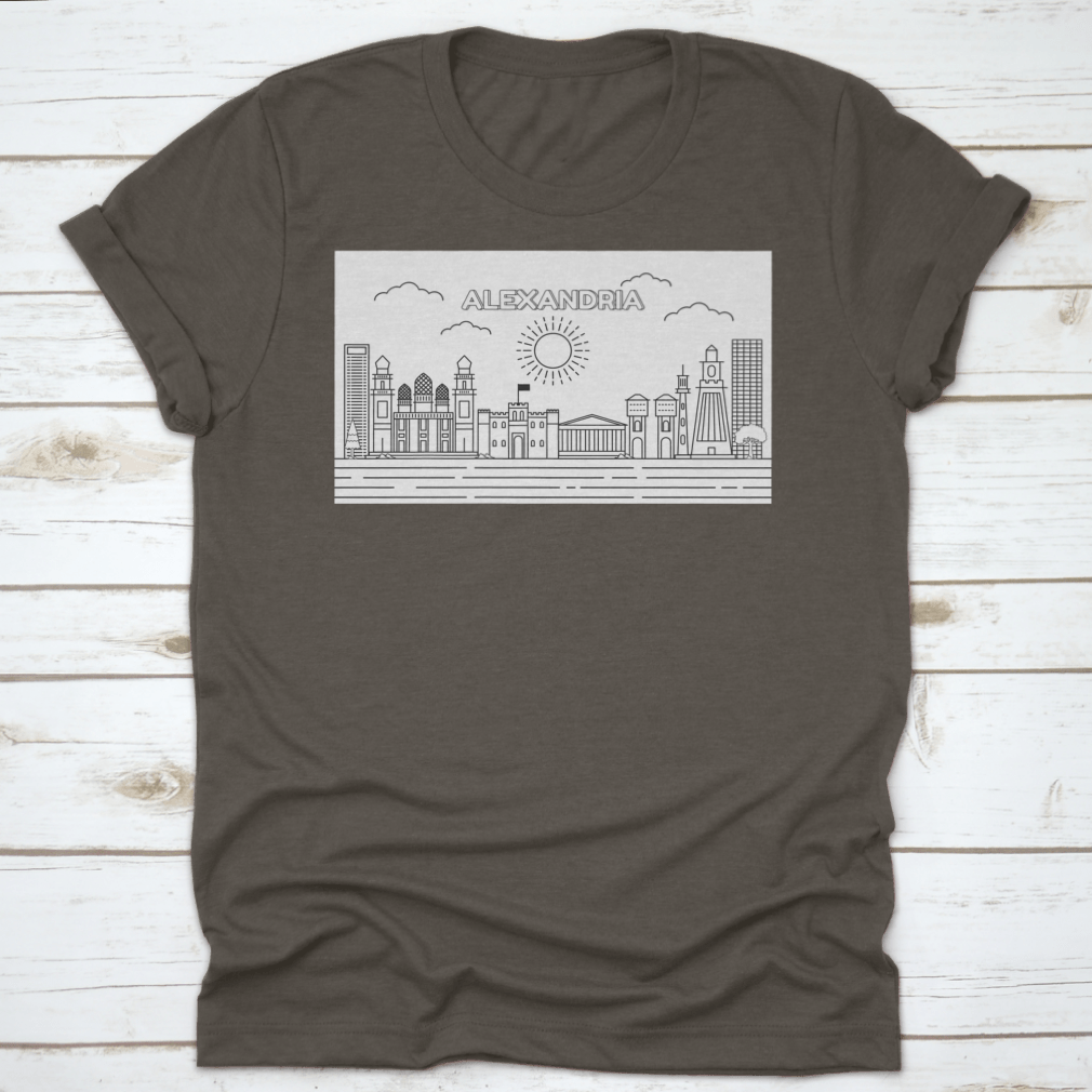 A stylish t-shirt featuring a line art illustration of the Alexandria skyline, showcasing its iconic buildings and structures.