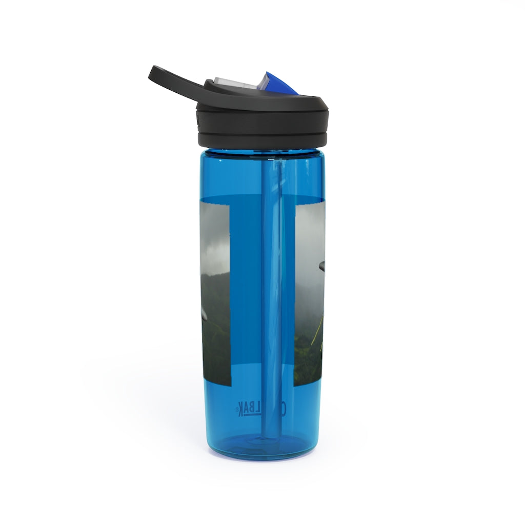 Alpha Creature CamelBak Eddy® Water Bottle in 20oz and 25oz sizes, showcasing its robust design and spill-proof valve.