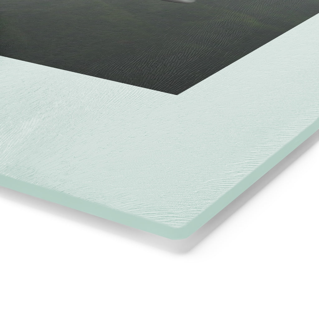 Alpha Creature Cutting Board made of tempered glass with rubber dots for stability, showcasing a unique design.