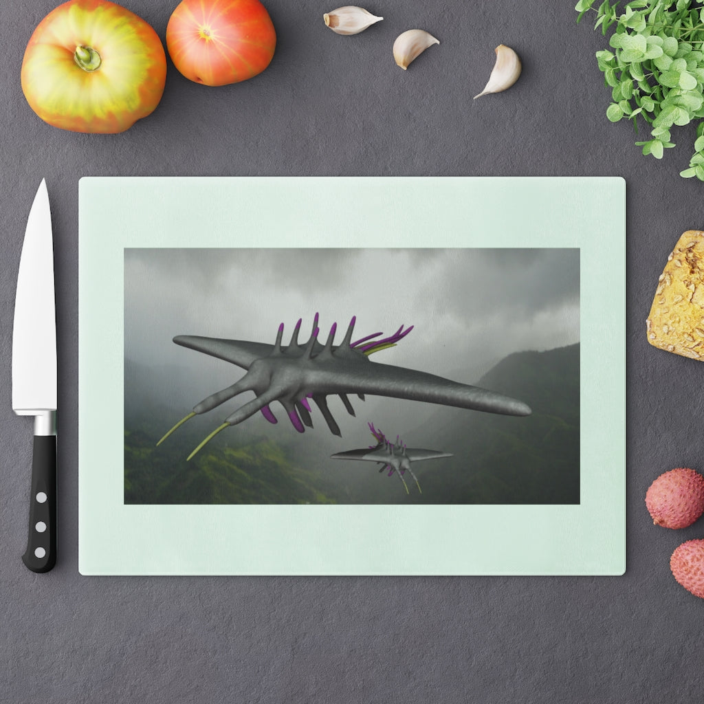 Alpha Creature Cutting Board made of tempered glass with rubber dots for stability, showcasing a unique design.