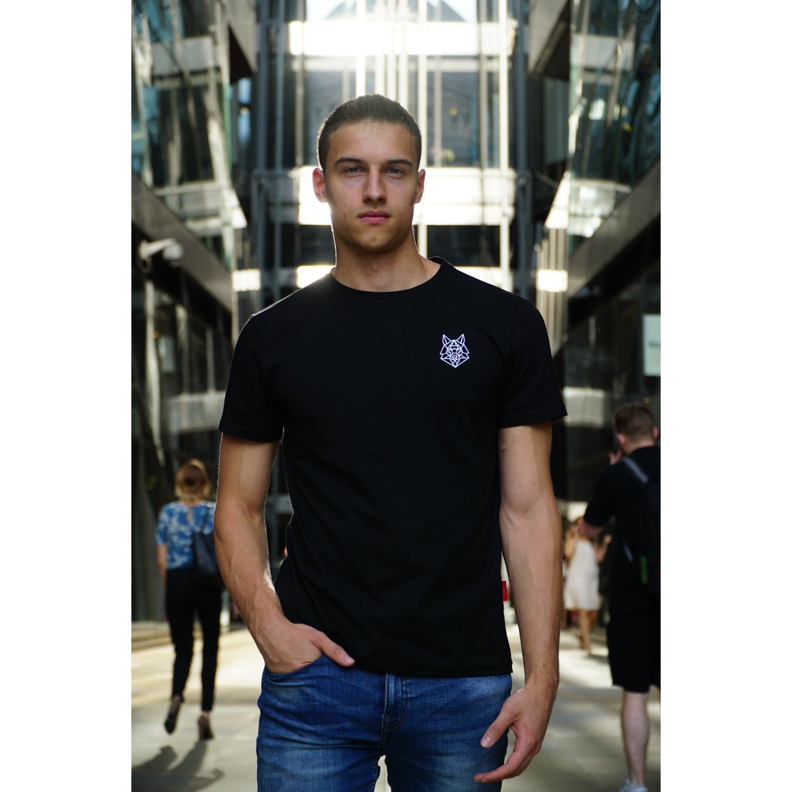 Alpha Wolfe Signature Black T-shirt featuring a fitted design and white embroidered logo on the chest.