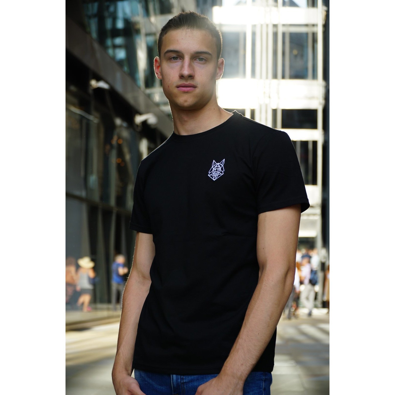 Alpha Wolfe Signature Black T-shirt featuring a fitted design and white embroidered logo on the chest.