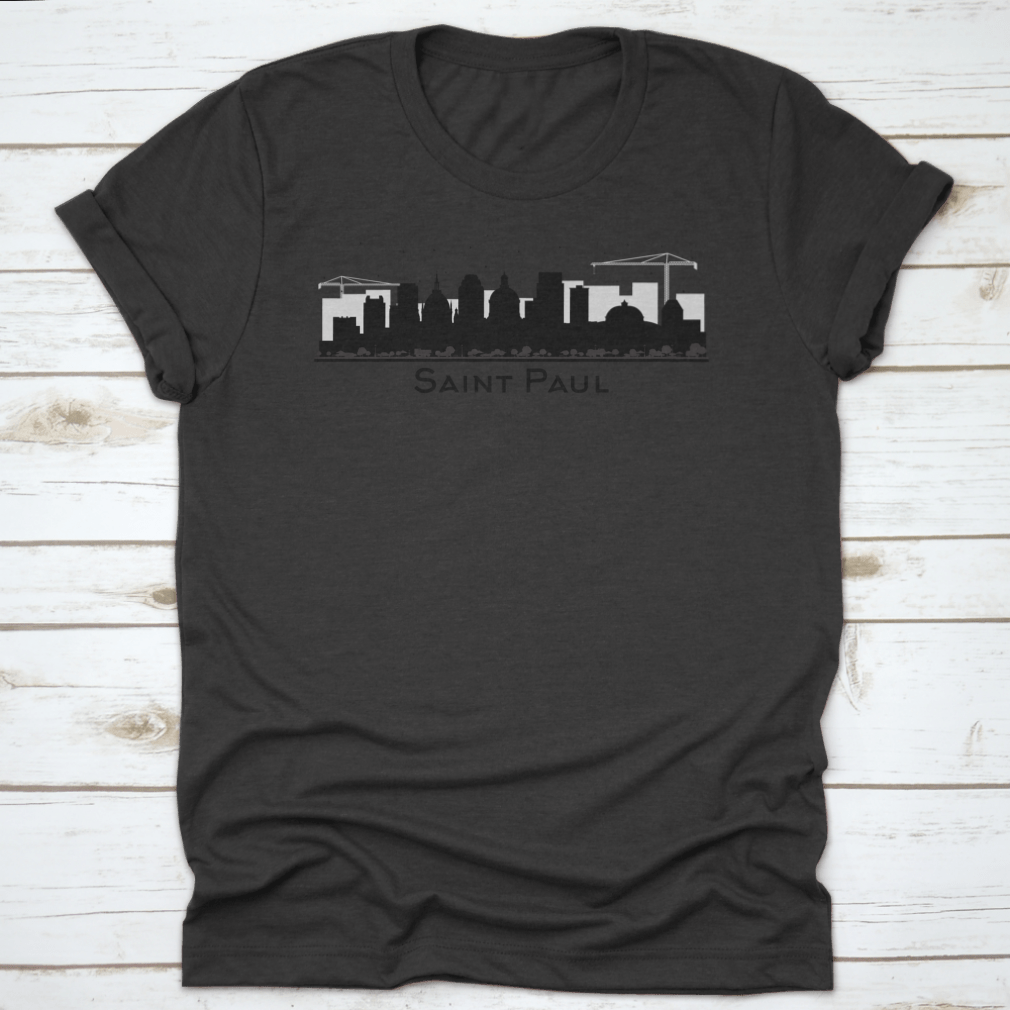 A stylish black t-shirt featuring the silhouette of the Saint Paul Minnesota city skyline, showcasing iconic buildings.
