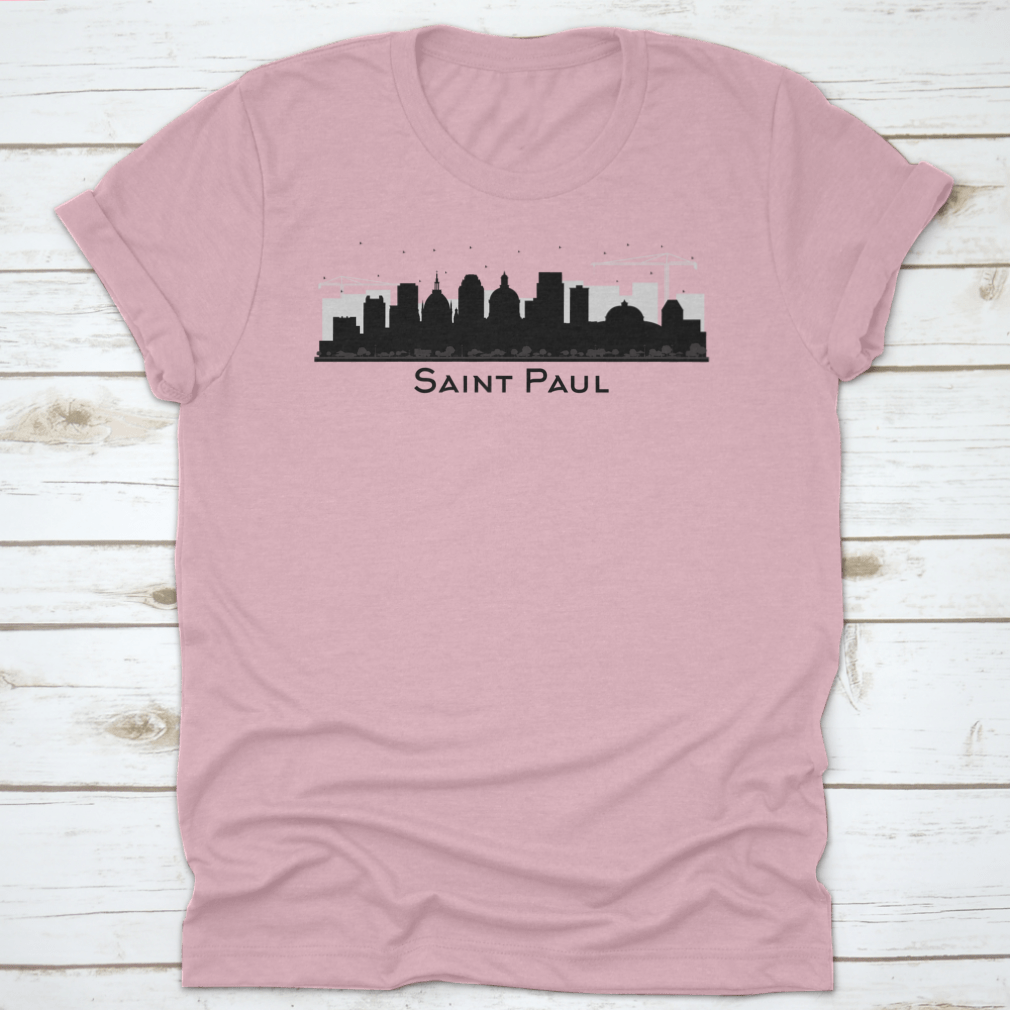 A stylish black t-shirt featuring the silhouette of the Saint Paul Minnesota city skyline, showcasing iconic buildings.