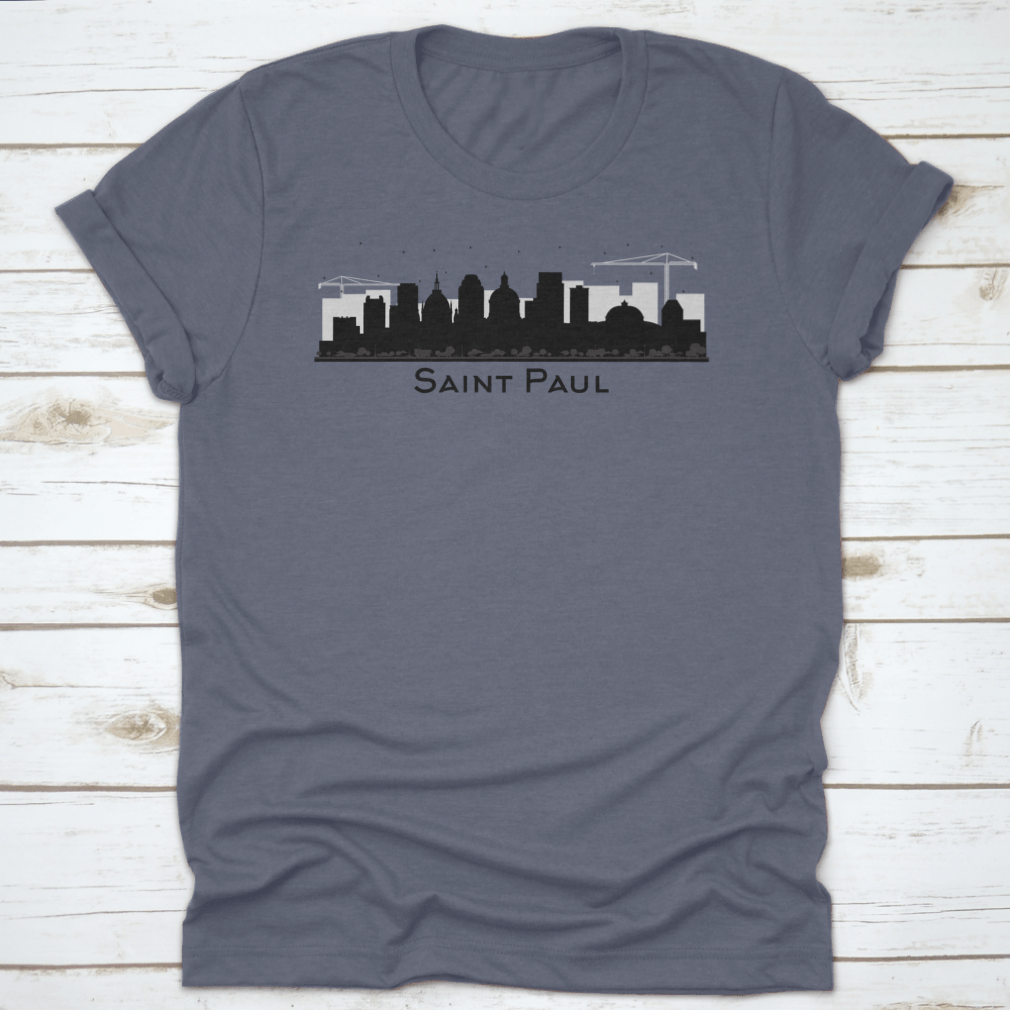 A stylish black t-shirt featuring the silhouette of the Saint Paul Minnesota city skyline, showcasing iconic buildings.
