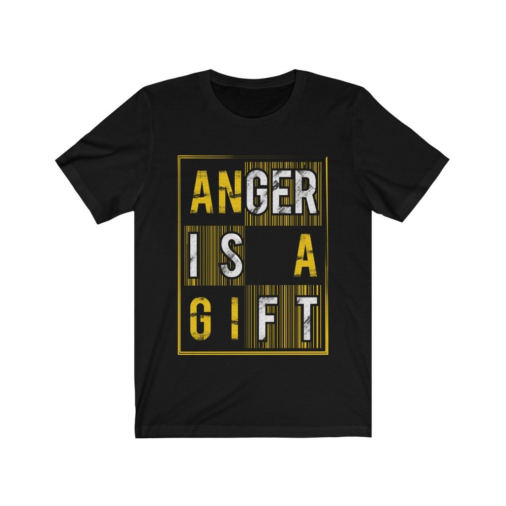 A stylish unisex t-shirt featuring the phrase 'Anger is a Gift', made from soft cotton, available in various sizes.