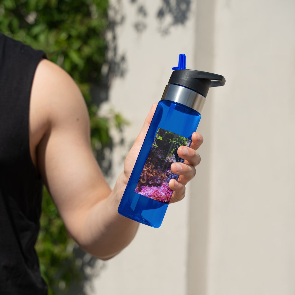 Aquarium Kensington Tritan™ Sport Bottle in vibrant colors with a carabiner hook and straw lid, showcasing its sleek design and 20oz capacity.