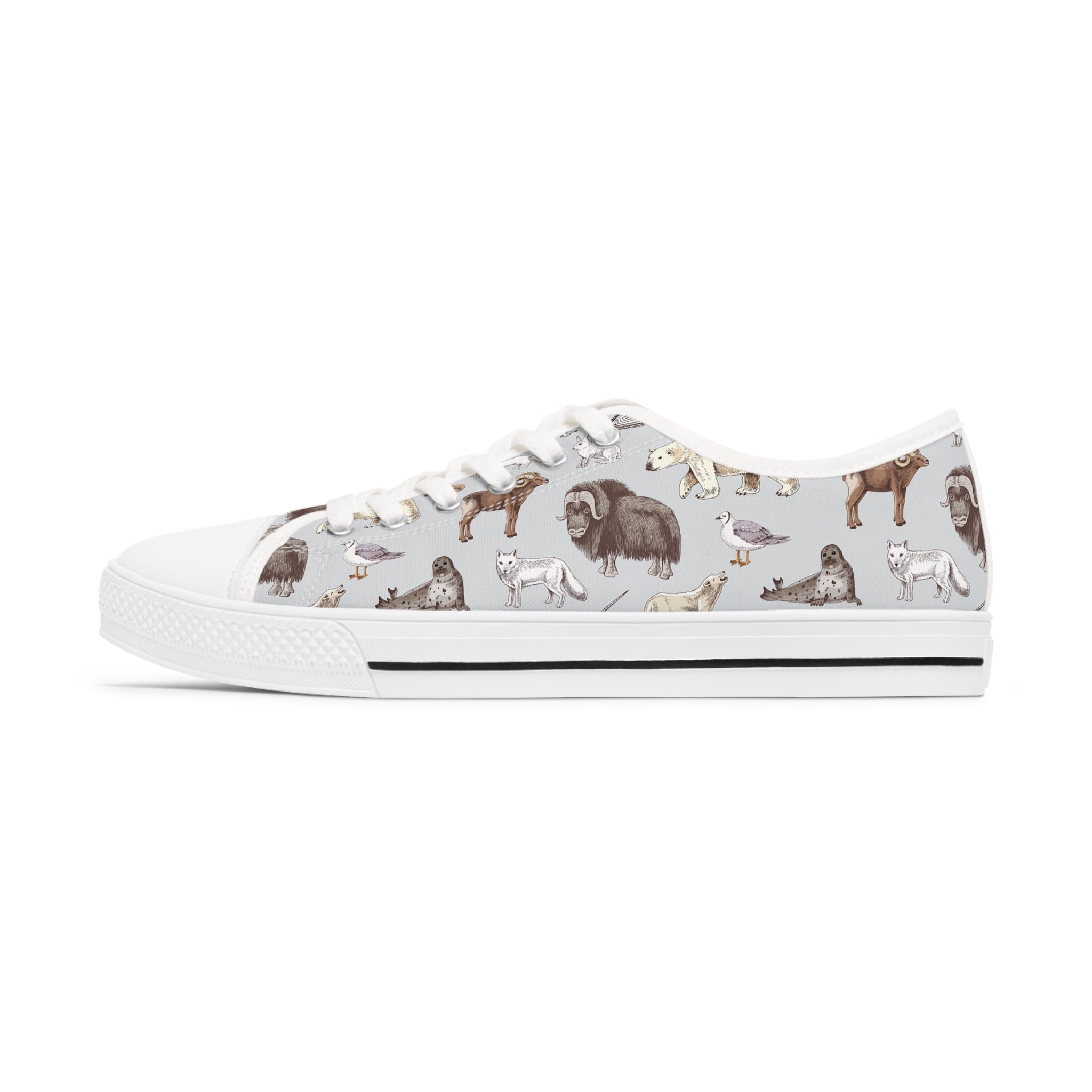 A pair of Arctic Animals Women's Low Top Sneakers featuring breathable polyester canvas, memory foam insoles, and customizable designs in black and white.