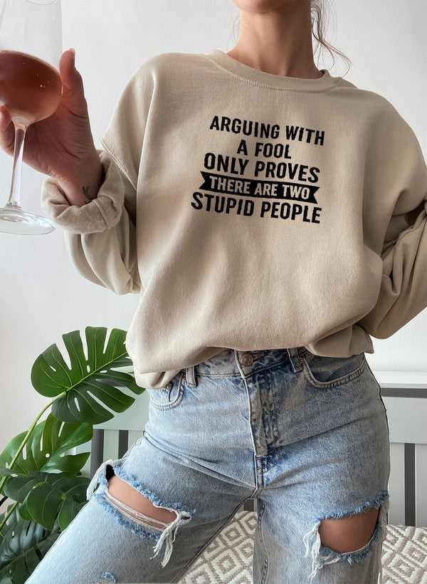 Arguing With A Fool Sweat Shirt featuring a cozy fleece lining and adjustable cuffs, designed for comfort and style.