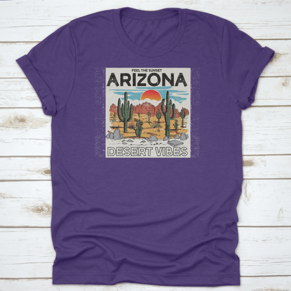 Arizona Desert Vibes graphic tee featuring the text 'Feel The Sunset', showcasing a vibrant sunset illustration on a comfortable cotton shirt.