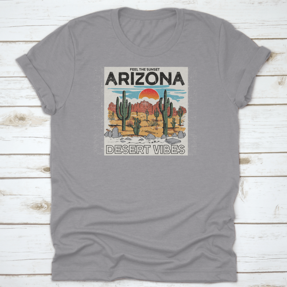 Arizona Desert Vibes graphic tee featuring the text 'Feel The Sunset', showcasing a vibrant sunset illustration on a comfortable cotton shirt.