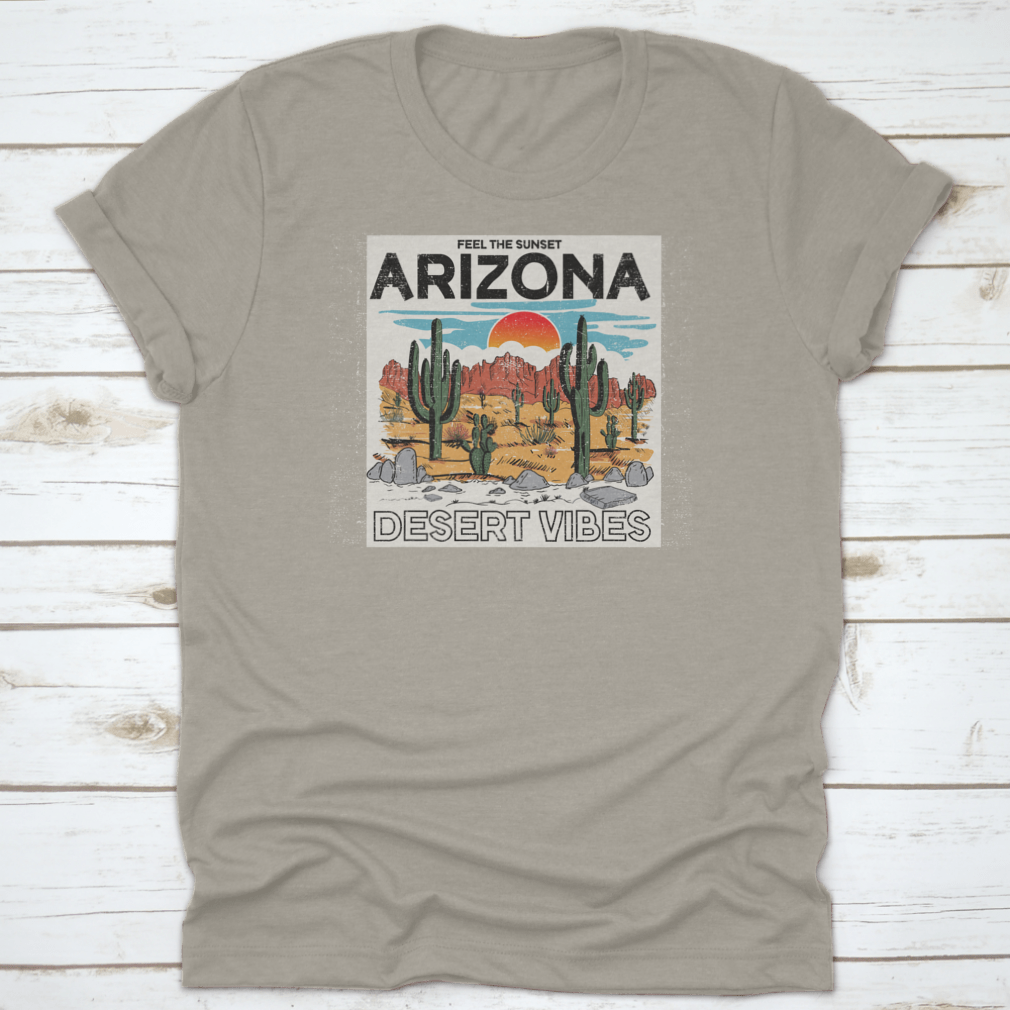 Arizona Desert Vibes graphic tee featuring the text 'Feel The Sunset', showcasing a vibrant sunset illustration on a comfortable cotton shirt.
