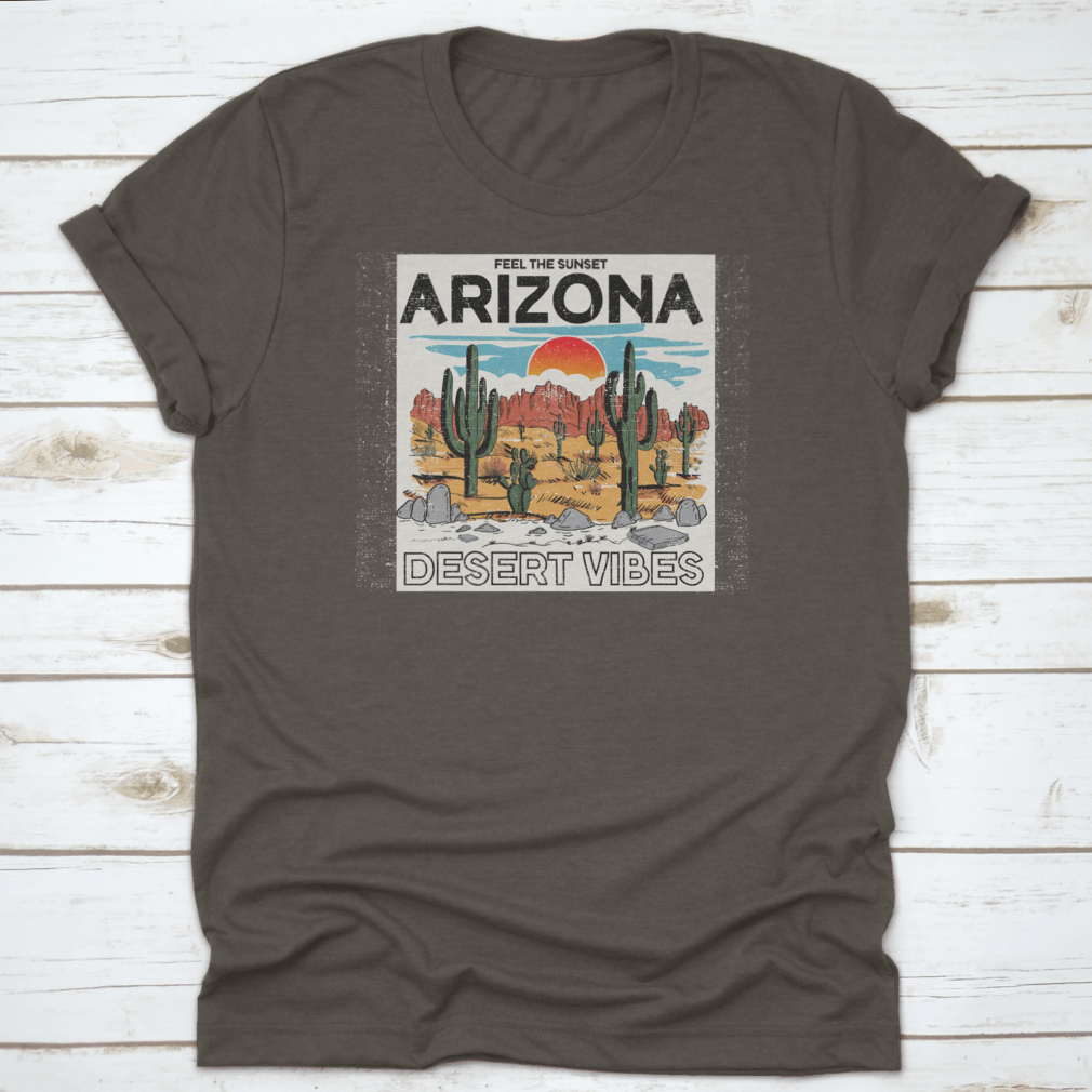Arizona Desert Vibes graphic tee featuring the text 'Feel The Sunset', showcasing a vibrant sunset illustration on a comfortable cotton shirt.