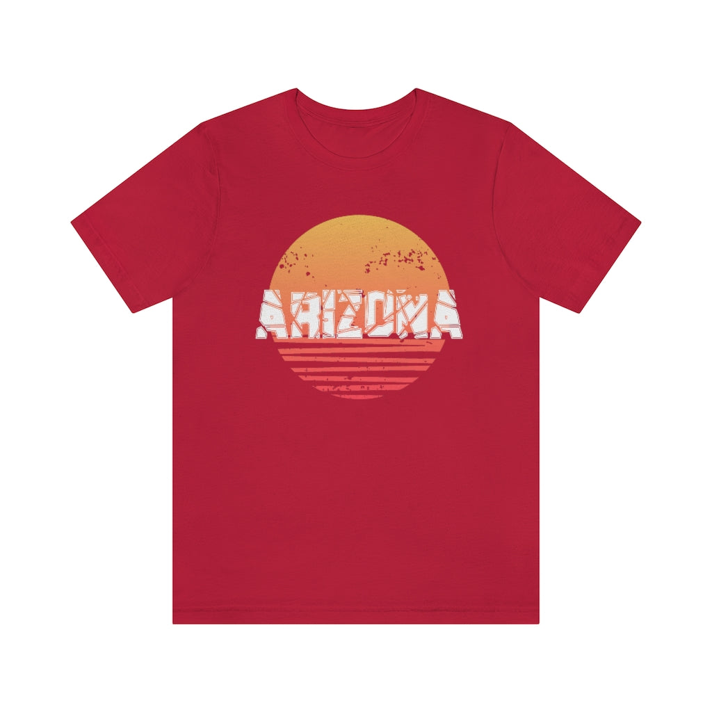 Arizona Sunset Souvenir T-Shirt featuring vibrant sunset design on soft cotton fabric, perfect for travel enthusiasts.