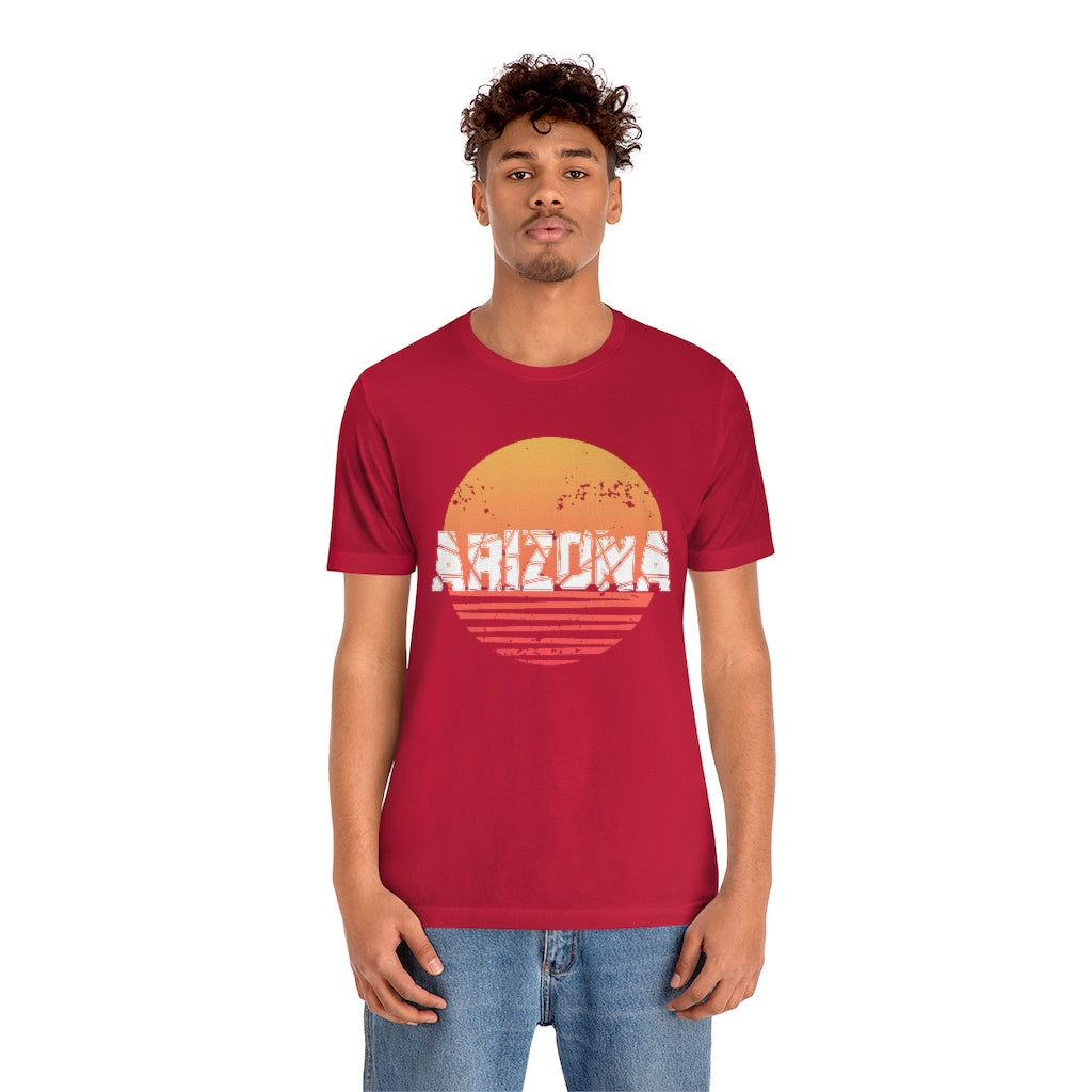 Arizona Sunset Souvenir T-Shirt featuring vibrant sunset design on soft cotton fabric, perfect for travel enthusiasts.